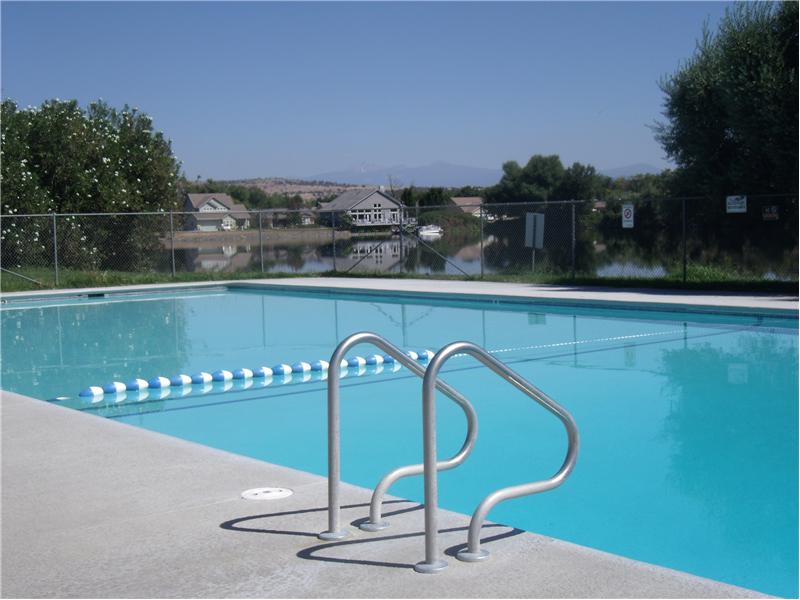 Community Pool With Lake View