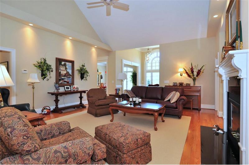 Spacious greatroom overlooks the lush backyard