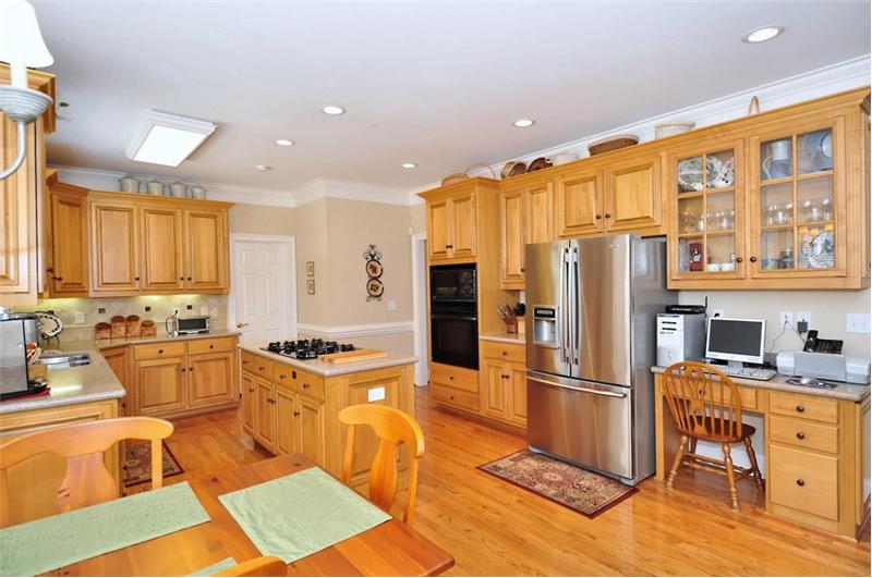 Gorgeous hardwood flooring and large pantry