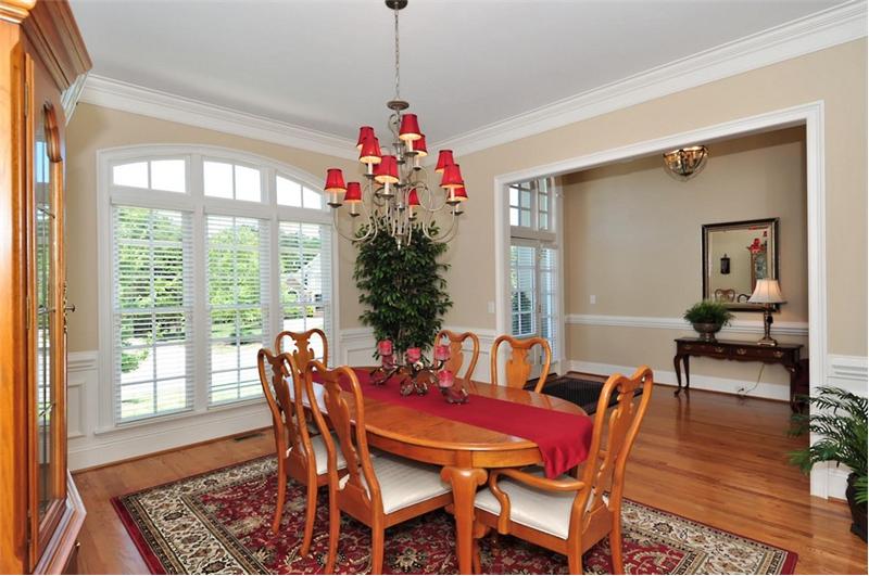 Dining room has custom millwork and moldings
