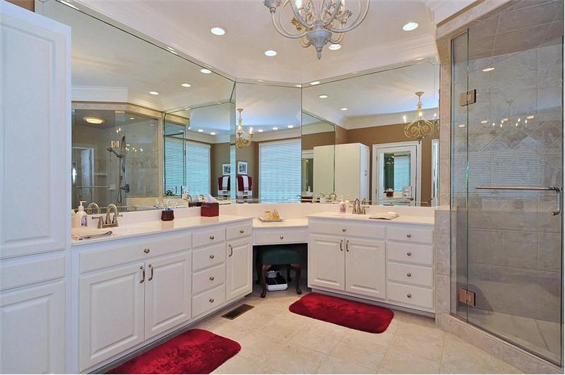 Luxury MBA has dual vanities and unique, glass enclosed walk-in shower